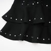 Fabienne -schwarzes, mit Kristallen verziertes, gerafftes Strick-Minikleid